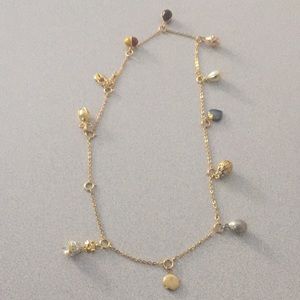 Gold Joan Rivers Egg Charm Necklace